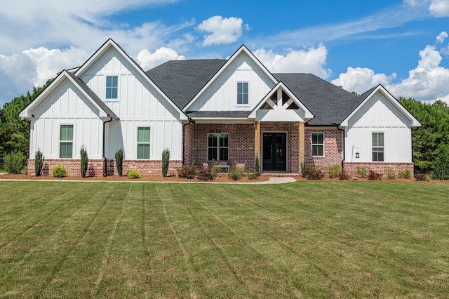 7181 Moontown Rd, Appling, GA 30802 - view of front of property featuring brick siding, board and batten siding, and a front lawn