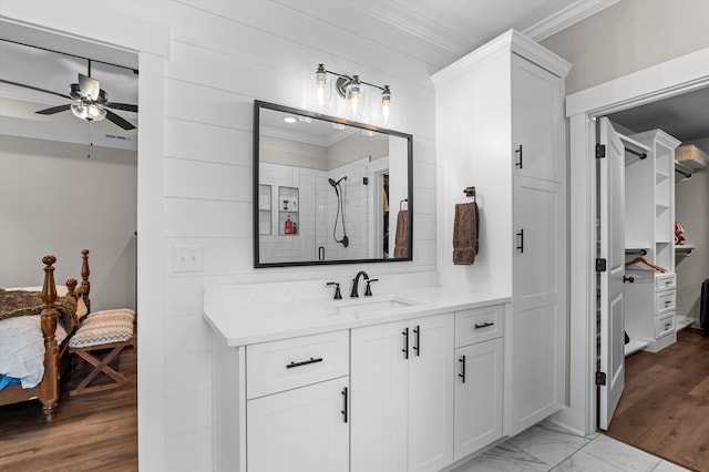 7181 Moontown Rd, Appling, GA 30802 - bathroom featuring crown molding, ceiling fan, vanity, and a tile shower