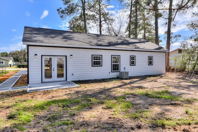 back of house featuring cooling unit, french doors, and a patio area