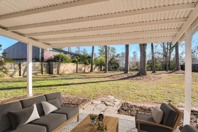 view of patio with outdoor lounge area and fence