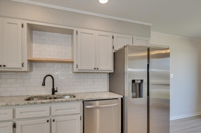 kitchen featuring ornamental molding, a sink, open shelves, tasteful backsplash, and stainless steel appliances