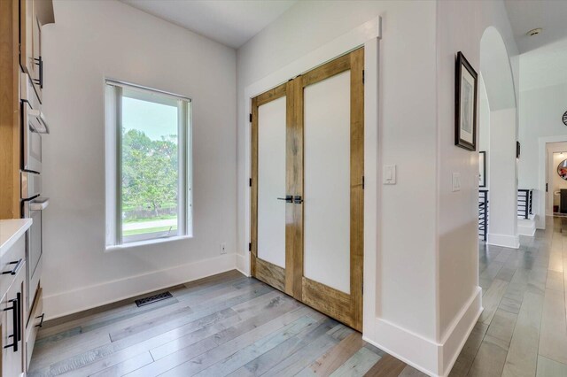 interior space with light hardwood / wood-style floors