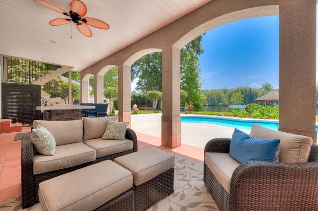 view of patio with an outdoor hangout area and ceiling fan