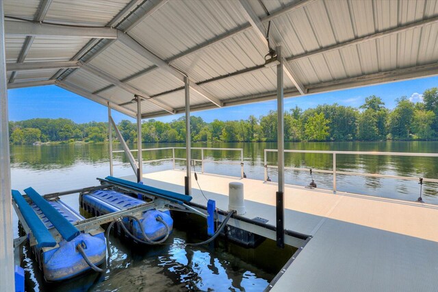 dock area featuring a water view