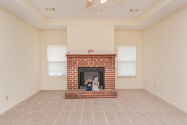 2114 Southlake Pkwy, Augusta, GA 30906 - unfurnished living room featuring a ceiling fan, a brick fireplace, and carpet