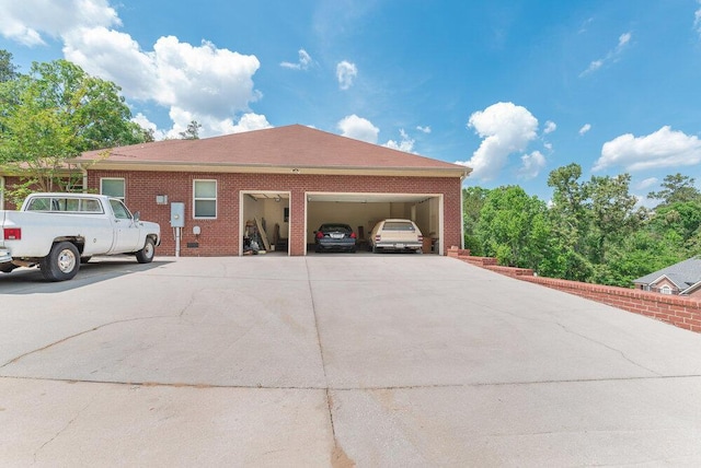 2114 Southlake Pkwy, Augusta, GA 30906 - view of side of property featuring brick siding, driveway, and an attached garage