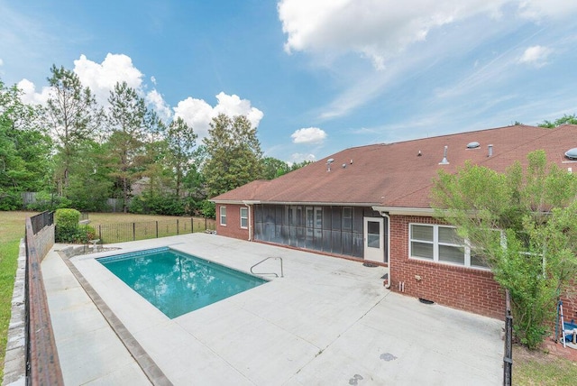 2114 Southlake Pkwy, Augusta, GA 30906 - view of swimming pool featuring a patio and a sunroom