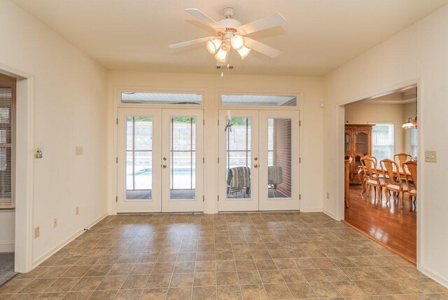 2114 Southlake Pkwy, Augusta, GA 30906 - entrance foyer with french doors, healthy amount of natural light, a ceiling fan, and stone finish floors