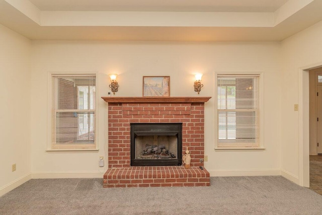 2114 Southlake Pkwy, Augusta, GA 30906 - unfurnished living room with a fireplace, carpet floors, and plenty of natural light