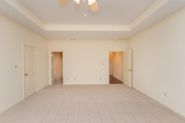 2114 Southlake Pkwy, Augusta, GA 30906 - empty room featuring a raised ceiling, ceiling fan, and light colored carpet