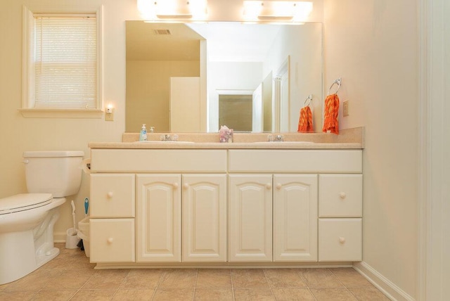 2114 Southlake Pkwy, Augusta, GA 30906 - bathroom featuring double vanity and tile patterned floors