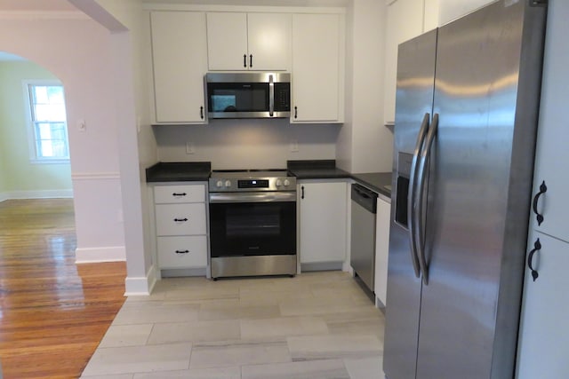 kitchen with white cabinets and stainless steel appliances