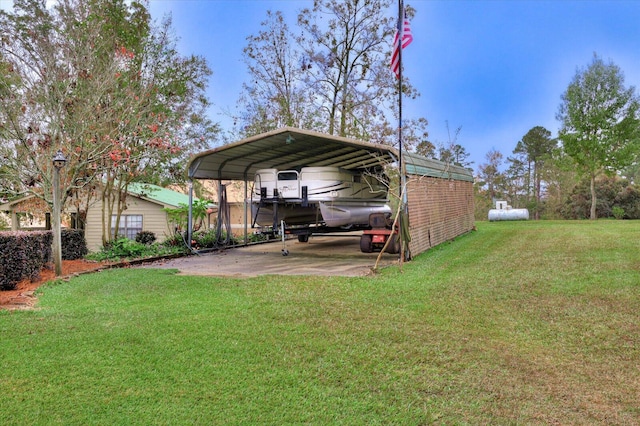 view of yard with a carport