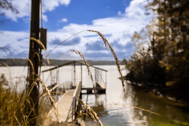 view of dock featuring a water view