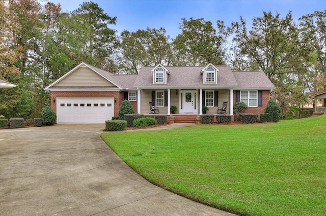 cape cod house with covered porch, a garage, and a front yard