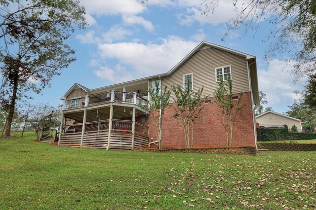 back of property with a lawn