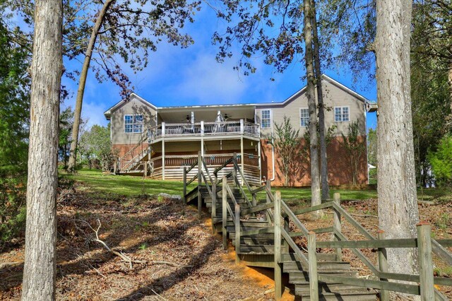 rear view of house featuring a porch