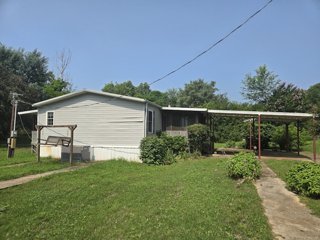 1667 Eden Hall Rd, Bradley, SC 29819 - view of home's exterior with a yard, central AC unit, and a sunroom