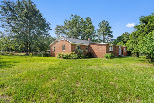 108 Frances Dr, North Augusta, SC 29841 - view of home's exterior with brick siding and a chimney