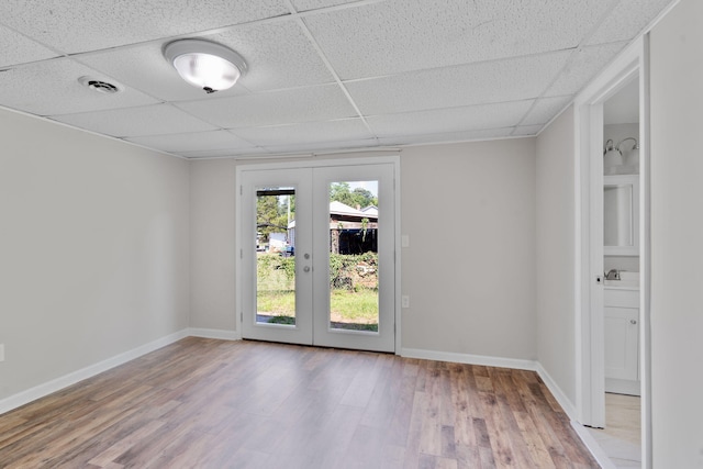 108 Frances Dr, North Augusta, SC 29841 - empty room featuring a paneled ceiling, french doors, and wood finished floors
