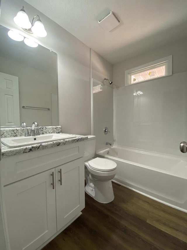 2113 Dyer St, Augusta, GA 30901 - bathroom featuring wood finished floors, vanity,  shower combination, and toilet