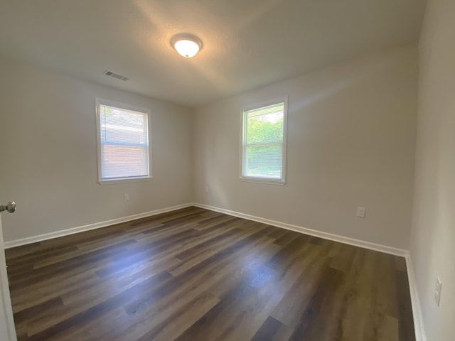 2113 Dyer St, Augusta, GA 30901 - empty room with dark wood-type flooring and baseboards