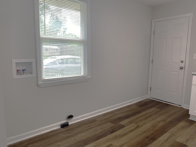2113 Dyer St, Augusta, GA 30901 - laundry area featuring washer hookup, healthy amount of natural light, wood finished floors, and baseboards