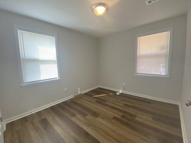 2113 Dyer St, Augusta, GA 30901 - spare room with baseboards and dark wood-style floors
