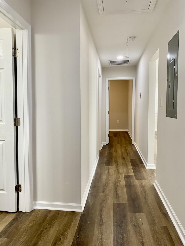 2113 Dyer St, Augusta, GA 30901 - corridor with attic access, electric panel, dark wood-style flooring, and baseboards