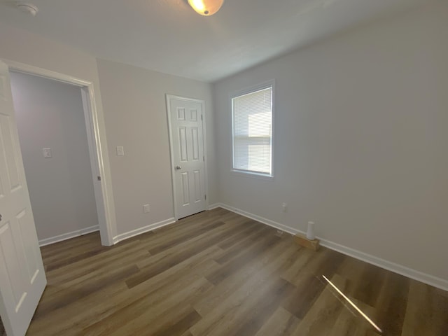2113 Dyer St, Augusta, GA 30901 - unfurnished bedroom with wood finished floors and baseboards