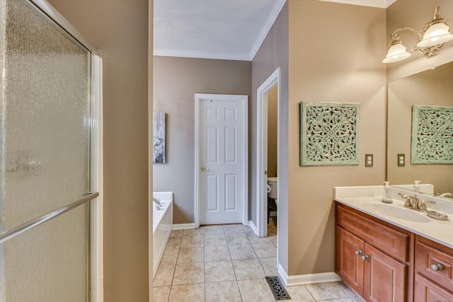 bathroom with toilet, vanity, ornamental molding, a bath, and tile patterned floors