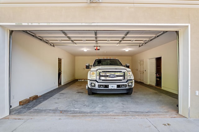 basement with ceiling fan and concrete block wall