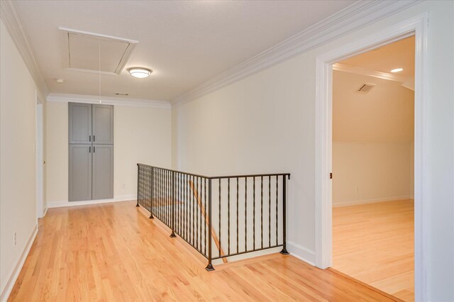 3954 Hammonds Fry, Evans, GA 30809 - hall with attic access, light wood finished floors, ornamental molding, and an upstairs landing