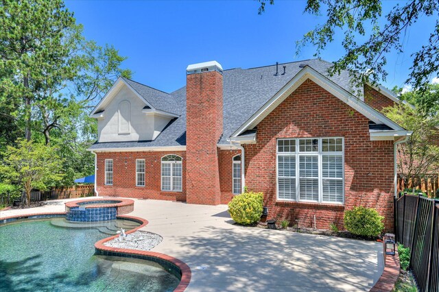 3954 Hammonds Fry, Evans, GA 30809 - back of property featuring brick siding, a fenced backyard, a chimney, and a patio