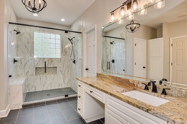 3954 Hammonds Fry, Evans, GA 30809 - bathroom featuring a chandelier, a marble finish shower, vanity, and tile patterned floors