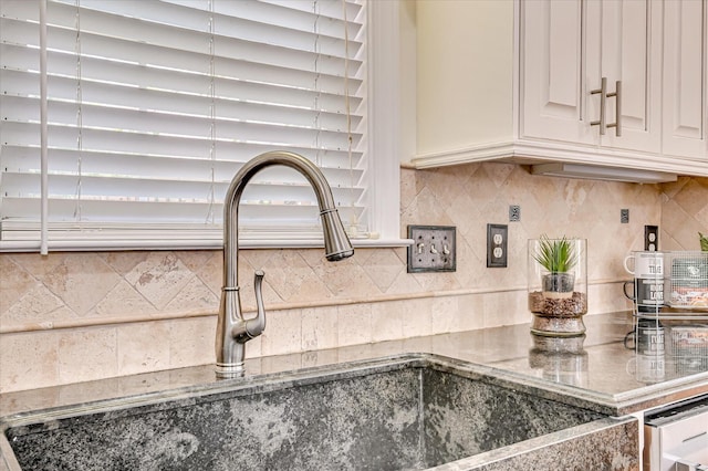 3954 Hammonds Fry, Evans, GA 30809 - detailed view of backsplash, stone countertops, and white cabinetry