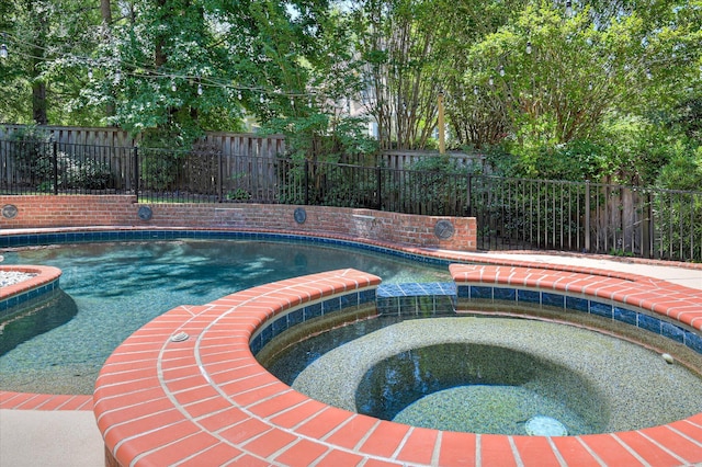 3954 Hammonds Fry, Evans, GA 30809 - view of pool featuring a fenced backyard and a pool with connected hot tub