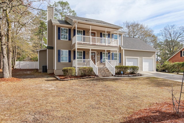 view of front facade with a porch and a garage