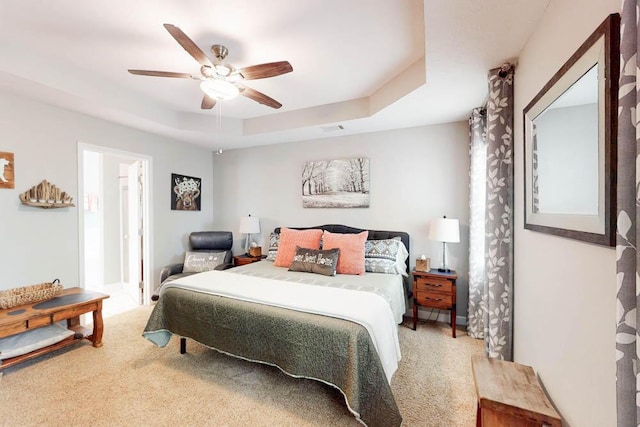 10 Weyanoke Ct, Aiken, SC 29803 - bedroom featuring a raised ceiling, light carpet, and ceiling fan