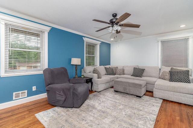 2211 Mura Dr, Augusta, GA 30906 - living room featuring wood finished floors, a ceiling fan, baseboards, crown molding, and recessed lighting