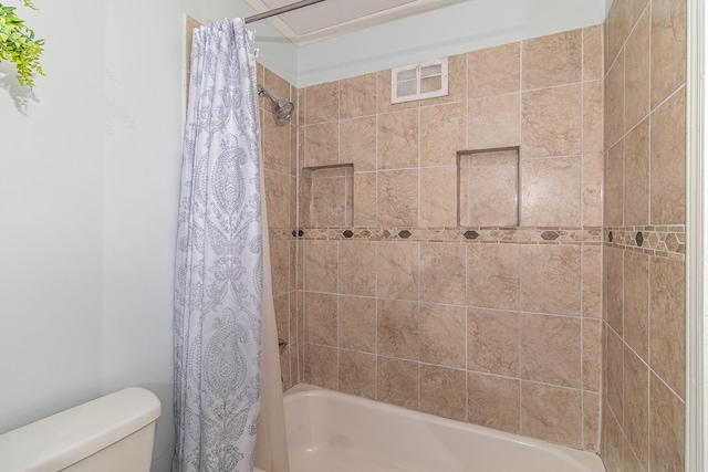 2211 Mura Dr, Augusta, GA 30906 - full bathroom featuring shower / bathtub combination with curtain and toilet