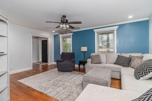 2211 Mura Dr, Augusta, GA 30906 - living room featuring a ceiling fan, ornamental molding, wood finished floors, plenty of natural light, and baseboards