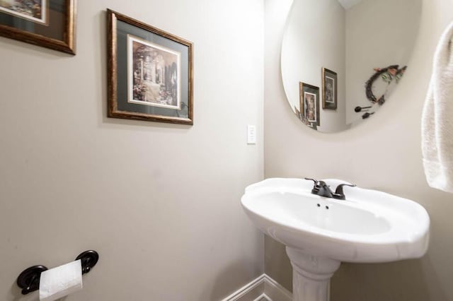 bathroom featuring baseboards