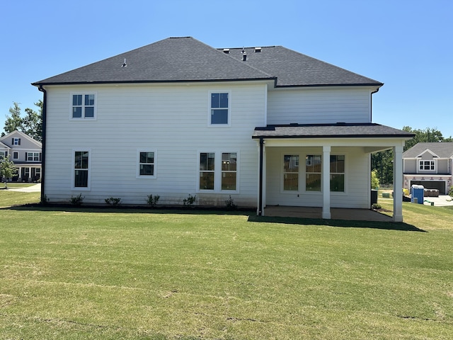 254 Prominence Dr Unit Tp52, Grovetown, GA 30813 - rear view of house with a yard, a patio area, and a shingled roof