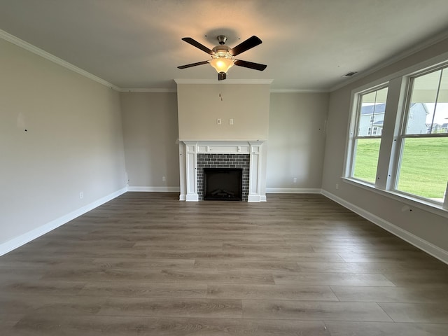 254 Prominence Dr Unit Tp52, Grovetown, GA 30813 - unfurnished living room featuring wood finished floors, ceiling fan, a fireplace, crown molding, and baseboards
