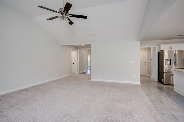 913 Goodale Dr, Augusta, GA 30909 - living room featuring ceiling fan with notable chandelier, light colored carpet, vaulted ceiling, and sink