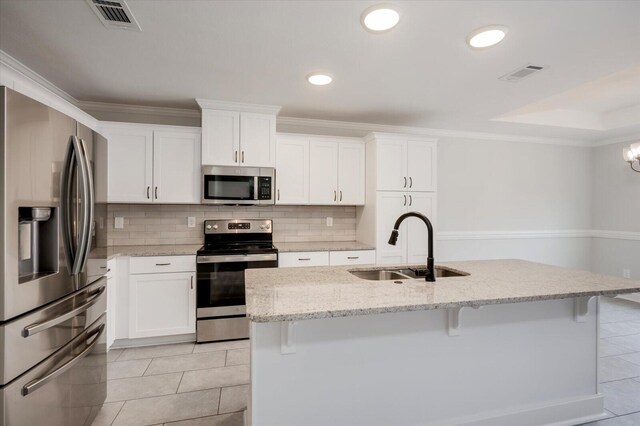 913 Goodale Dr, Augusta, GA 30909 - dining space with ceiling fan with notable chandelier, crown molding, light tile patterned floors, and sink