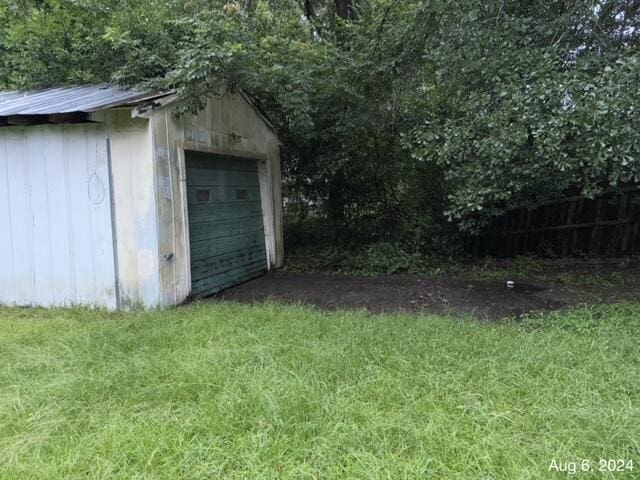 view of outbuilding featuring a garage