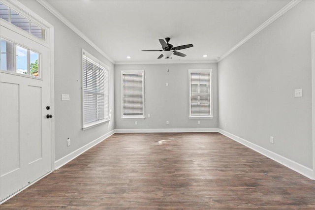 entrance foyer with ceiling fan, dark wood-type flooring, and crown molding