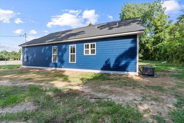 back of property featuring central air condition unit